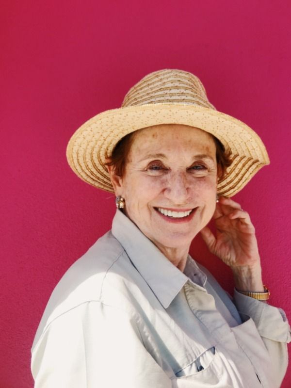 A Mature Woman wearing hat