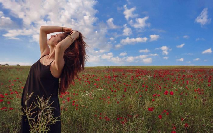 A female model posing in the greenary